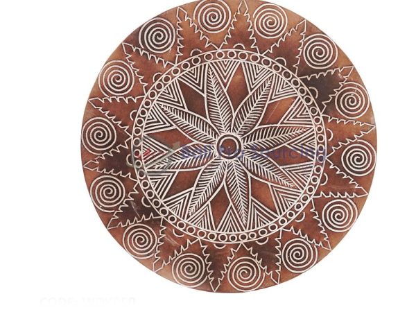 Sculpture ronde à motifs symétrique