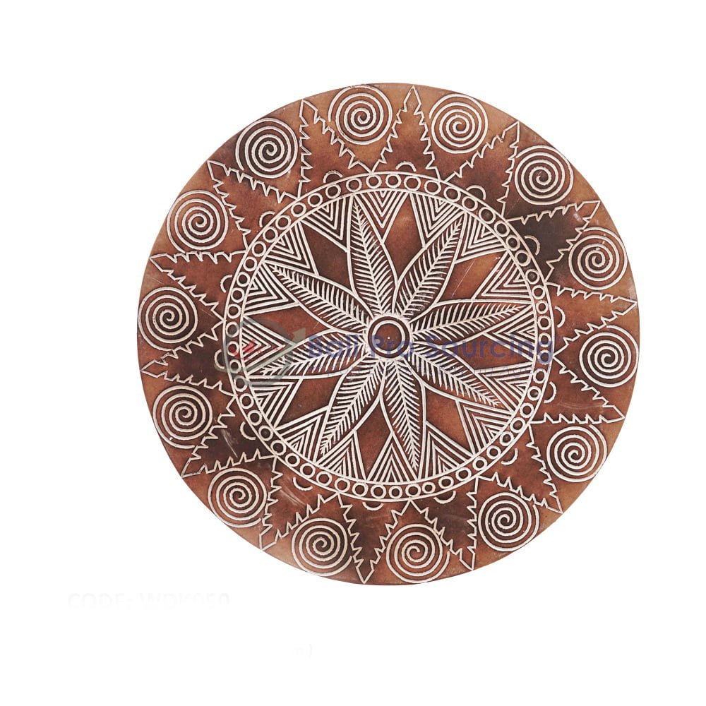 Sculpture ronde à motifs symétrique